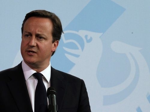 O primeiro-ministro do Reino Unido, David Cameron, em entrevista coletiva em Berlim Reuters