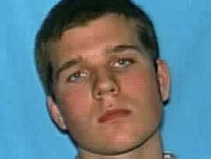 Polcia divulgou foto do estudante Ross Truett Ashley, de 22 anos, como atirador no campus da Virgina Tech.