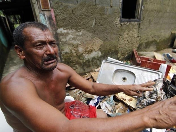 Pedreiro perdeu tudo aps enchente em Cubato, SP. (Foto: Carlos Nogueira / Jornal A Tribuna)