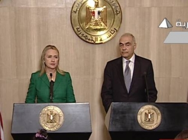 A secretria de Estado americana, Hillary Clinton, faz anncio de trgua entre Hamas e Israel, com o chanceler egpcio M