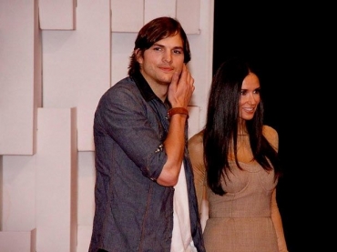 Ashton Kutcher e Demi Moore durante o SPFW